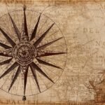a photo of a history compass on a map